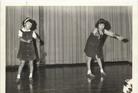 Two girls dancing (ddr-jamsj-1-563)