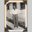 Man wearing a slim bowtie (ddr-densho-542-214)