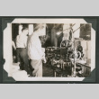 Men working labeling machine at cannery (ddr-densho-540-80)