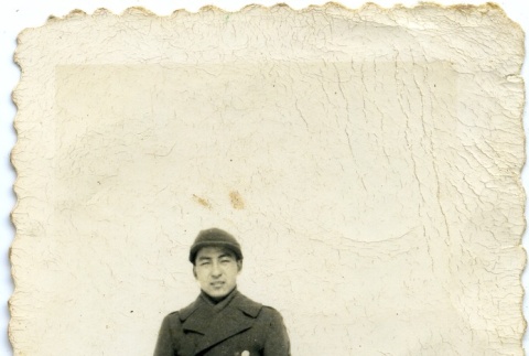 Herbert K. Yanamura standing in snow (ddr-densho-22-406)