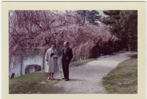 Kaneji Domoto and Elaine Reinelt on path in Japanese Garden (ddr-densho-377-1352)