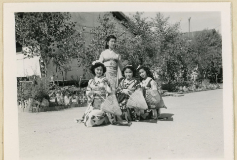 Dancers pose with parasols (ddr-densho-37-1643)