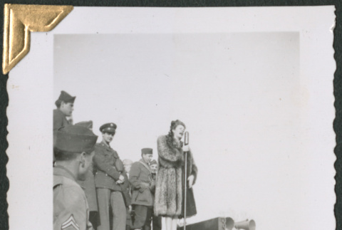 Martha Raye singing at microphone (ddr-densho-434-84)
