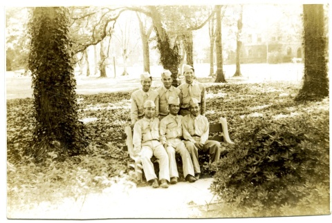 Soldiers sitting in a park (ddr-densho-22-219)