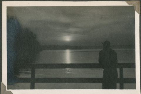 A man looking at a sunset (ddr-densho-201-866)