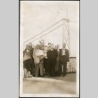 A group posing near a bridge (ddr-densho-316-64)
