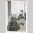 Two boys sitting on stoop (ddr-densho-483-536)