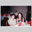 Tomi Iino and young woman at banquet (ddr-densho-368-351)