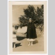 Henrietta Schoen posing in buttoned cloak (ddr-densho-223-24)