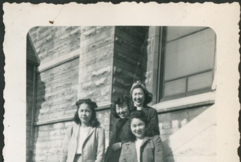 A group of friends standing on a staircase (ddr-densho-298-79)