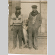 Two men holding a large fish (ddr-densho-430-188)