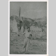 Figure standing with hands on hips (ddr-densho-1007-180)