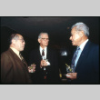 Shig Kihara, John Burden, and one other with cocktails (ddr-densho-1007-737)