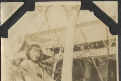 A woman on a bicycle (ddr-densho-432-138)