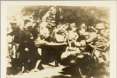 Lithuanian civilians saluting German soldiers on a motorcycle (ddr-njpa-13-897)