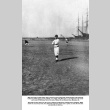 Three men in baseball uniforms standing in baseball field (ddr-ajah-5-73)