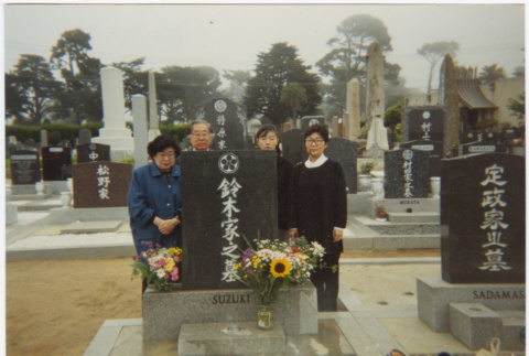 Martha Suzuki and Henri Takahashi with two unidentified women in cemetery (ddr-densho-426-449)