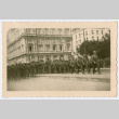 Soldiers marching on city street (ddr-densho-368-120)
