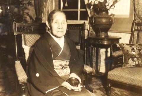 Woman seated in a chair (ddr-njpa-4-2334)