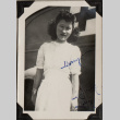Woman standing by medical vehicle (ddr-densho-587-57)