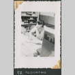 Man sitting at desk (ddr-densho-434-150)