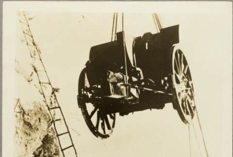 Soldiers lifting an anti-aircraft gun with a pulley system (ddr-njpa-13-811)