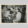 Six men around a table (ddr-densho-37-869)