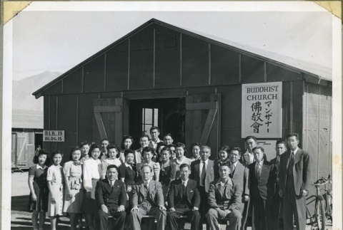 Group photograph outside the Manzanar Buddhist Church (ddr-manz-4-21)