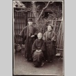 Married couple and mother in Japanese garden (ddr-densho-259-130)