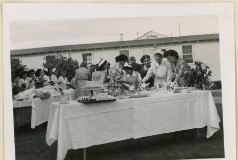 Refreshment table at hospital anniversary event (ddr-densho-37-987)