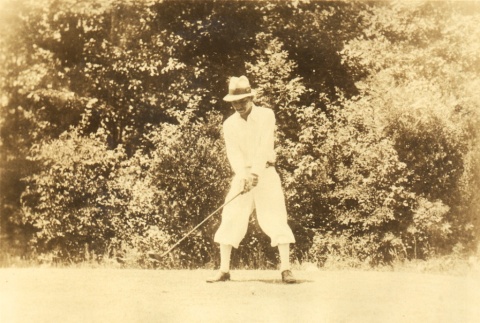Hiroshi Saito playing golf (ddr-njpa-4-2519)