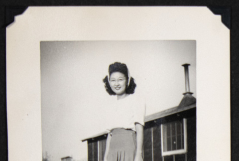 Tishi outside a barrack (ddr-densho-542-682)