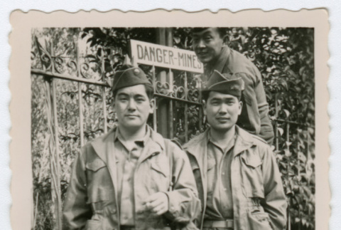 Soldiers in front of fence (ddr-densho-368-141)