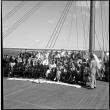 Group of passengers and crew on board ship (ddr-densho-426-264)