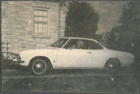 Agnes Sakura in driver's seat of Corvair Monza (ddr-densho-523-612)