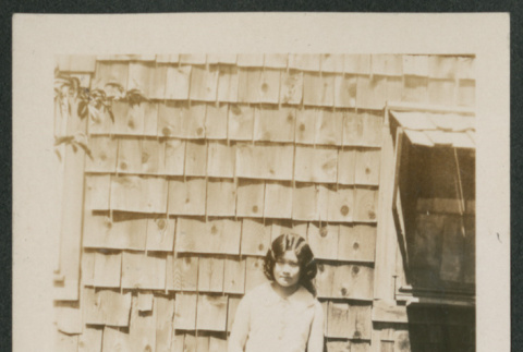 woman outside house (ddr-densho-378-590)