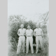 Three men in front of a bush (ddr-densho-1007-497)