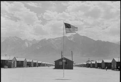 Barracks with American flag (ddr-densho-151-57)