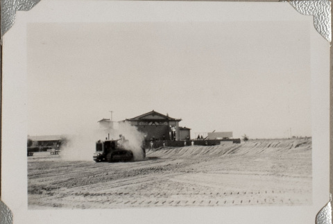 Tractor in dirt field (ddr-densho-587-31)