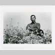 Portrait of a man with flowers (ddr-densho-1007-373)