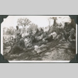 Men resting on hillside (ddr-ajah-2-184)