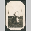 Photo of a family of three (ddr-densho-483-258)
