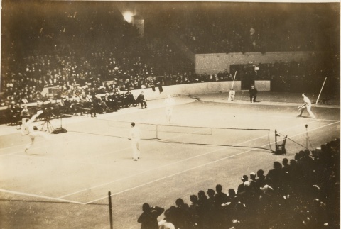 View of a doubles tennis match (ddr-njpa-1-2306)