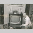 Chester Sakura Sr. with new TV (ddr-densho-523-451)