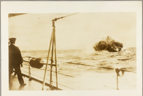 Sailors watching an explosion in the water near their ship (ddr-njpa-13-605)