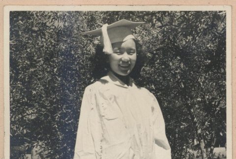 Woman in a graduation cap and gown (ddr-manz-10-77)