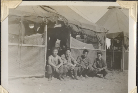 Four men outside tent (ddr-densho-466-741)