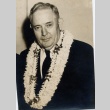 A man wearing leis (ddr-njpa-1-1242)