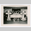 Christian funeral service attendees with casket (ddr-densho-475-299)