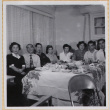 Group of men and women at a dinner party (ddr-densho-522-23)